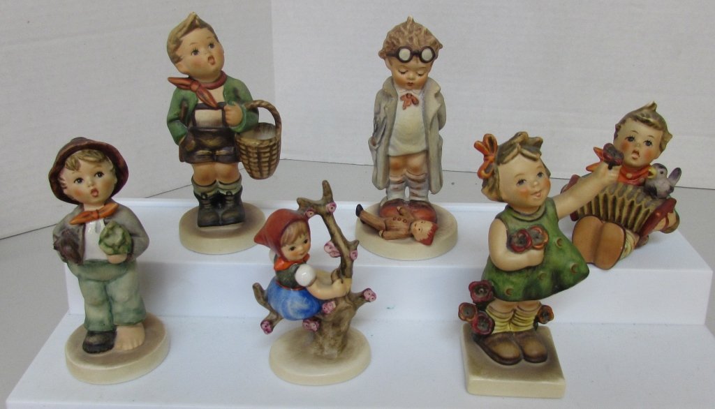 6 HUMMEL FIGURINE 51 2/0, 72, 110/0, 127, 141, 374: 6 GENUINE GERMANY GOEBELS: #51 2/0 VILLAGE BOY 5"; #72 SPRING CHEER 5"; #110/0 LET'S SING 3"; #127 DOCTOR 5"; #141/3/0 APPLE TREE GIRL 4"; #374 LOST STOCKING 4 1/2". ALL NO CHIPS, NO CRACKS, MINOR WEA