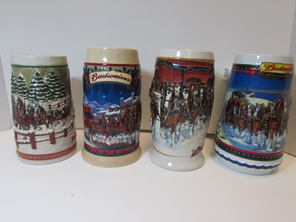 4 BUDWEISER BEER STEINS CLYDESDALE HORSES: 4 PORCELAIN BUD ANHEUSER-BUSCH CHRISTMAS HOLIDAY MUGS OLD TOWNE 2003, CERAMARTE, GUIDING THE WAY HOME 2002, 2006 SUNSET AT THE STABLES. 6.25" - 7" TALL. NO CHIPS OR CRACKS.