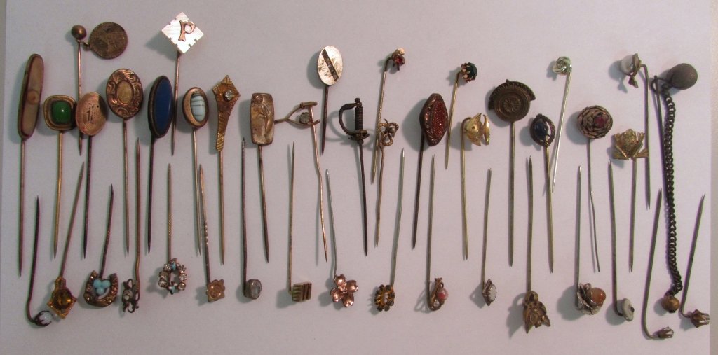 42 ANTIQUE PINS & CUSHION STICK OR HATPINS: 5.242 PIN PILLOW WITH 42 PINS. VARIOUS STYLES & MATERIALS. PINS 1.5" - 3.5" LONG.