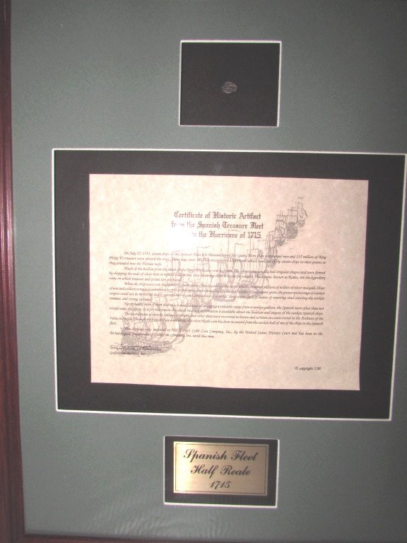 SPANISH FLEET COIN 1/2 REALE 1715 FRAMED w/ COA: 76.29 ANTIQUE 300 YEAR OLD HISTORIC ARTIFACT - SILVER 1/2 REALE FROM SPANISH TREASURE FLEET. SOLID SILVER. CERTIFIED, & FRAMED.