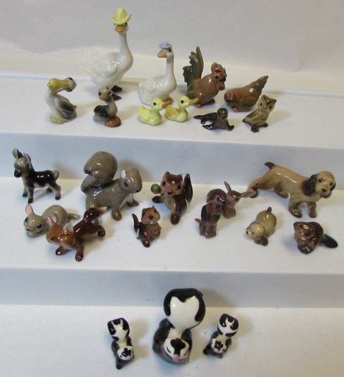 24PC MINIATURE PORCELAIN ANIMAL FIGURINE COLLECTION: 24 PIECES INCLUDING SQUIRRELS, DUCKLINGS, GEESE, OTTOR, DOGS, PELICAN, SKUNKS, MICE, OWL, HEN ROOSTER, DONKEY. MEASURE BETWEEN 1" - 2"