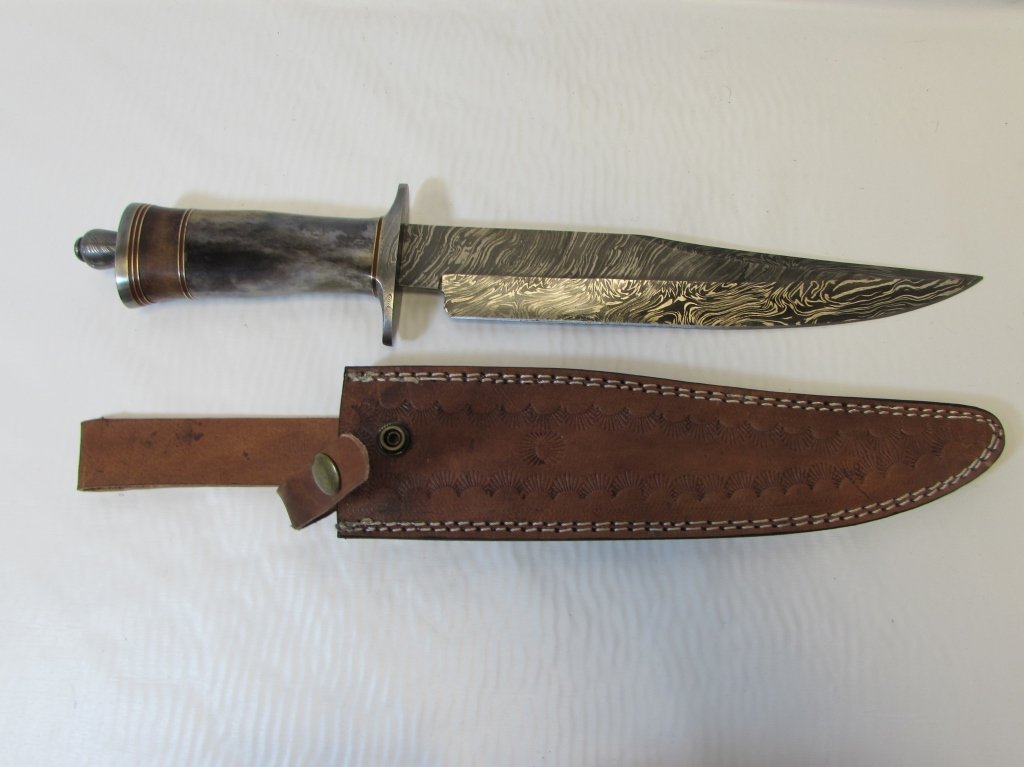 CUSTOM DAMASCUS HANDMADE KNIFE & SHEATH BONE WOOD: HAND MADE KNIFE. 9.75" DAMASCUS BLADE, BONE & WOOD HANDLE. 15.25" OVERALL.