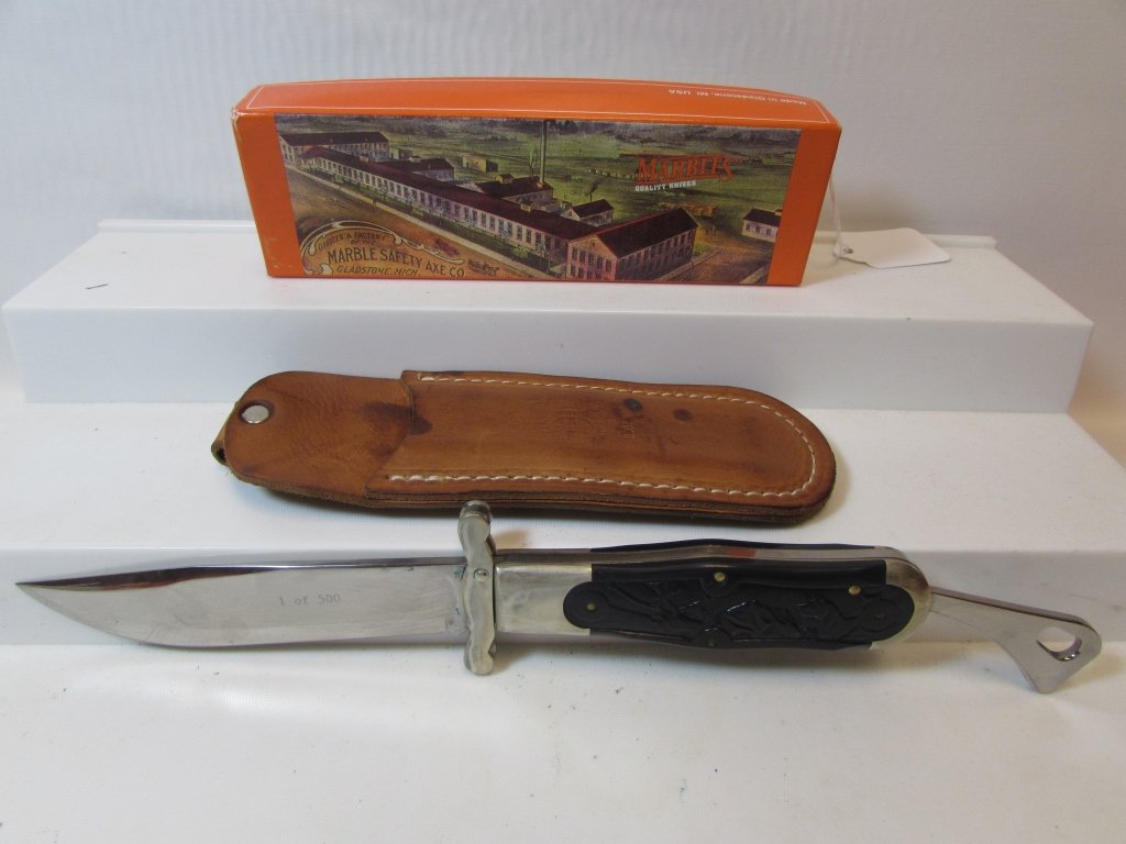MARBLES FOLDING FISH KNIFE NIB LIMITED EDITION: 249.74J MARBLE'S SAFETY AXE CO. POCKET KNIFE. #1 OF 500. IN ORIGINAL BOX w/ LEATHER SHEATH, POLY GRIPS. 4.5" BLADE, 11.5" OVERALL. (9.5" EXCLUDING BLADE REST). LEATHER SHEATH HAS SOME DISCOLORATION.