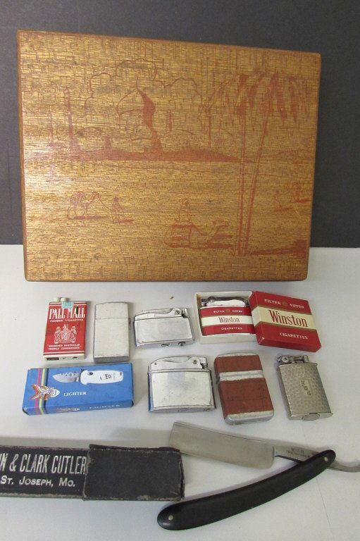 ETCHED WOOD CIGAR BOX, LIGHTER COLLECTION & RAZOR: HOBIE, RONSON, EVANS, STORM KING, WINSTON CIGARETTES, COMBINATION STILETTO POCKET KNIFE, AND PALL MALL LIGHTERS. INCLUDES A CURTIN CLARK STRAIGHT RAZOR ENGRAVED "THE WINNER HJH" FOR A BARBER COMPETITI