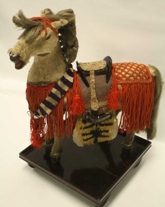 SAMURAI WARRIOR HORSE DOLL JAPANESE ANTIQUE STATUE: 268.42 JAPANESE HORSE STATUE. MADE OF WOOL & REAL HORSE HAIR, WOOD STAND. 18" TALL (INCLUDING STAND).
