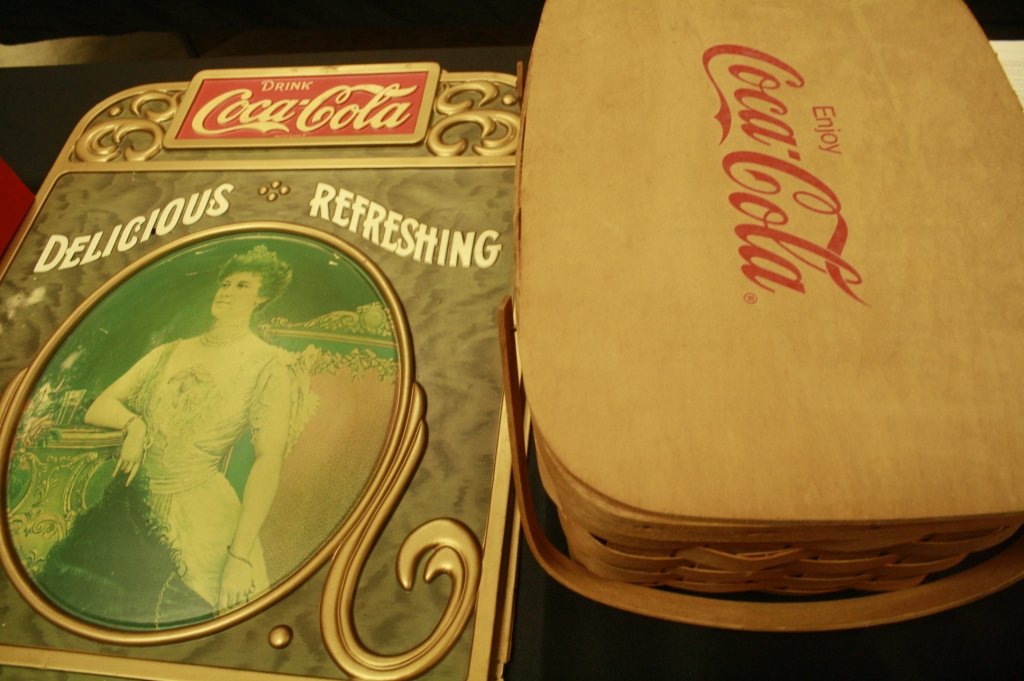 COKE SIGN & BASKET COCA~COLA VINTAGE AD: COKE ADVERTISING SIGN & PICNIC BASKET. SIGN 28.5" x 21"; BASKET 18" x 12" x 9".