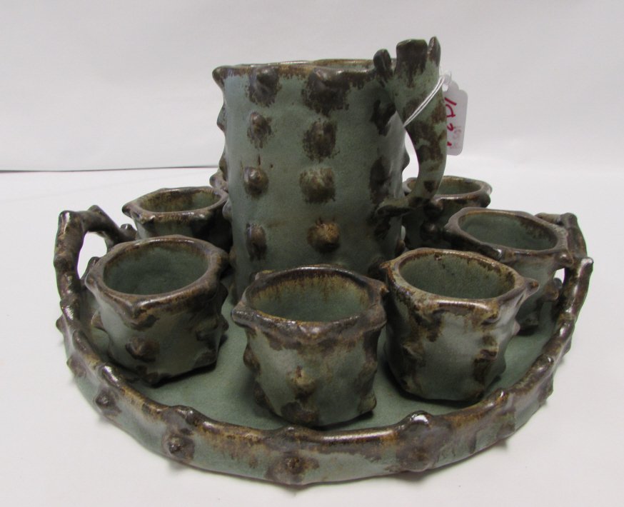 10p PITCHER CUPS TRAY CHILE GUANGUALI SRS POTTERY: 10 pc SET. HAND MADE POTTERY DISH SET. MADE IN GUAN GUALI, CHILE. 8 GLASSES 2.5" TALL, PITCHER 7" TALL, SERVING TRAY 14.5" WIDE. EXCELLENT CONDITION. NO CHIPS OR CRACKS.