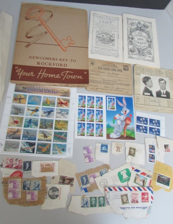 AMERICAN AIRCRAFT USAF STAMP SHEET & EPHEMERA: 1807 & 1907 FARMER'S ALMANAC REPLICAS. 1916 SAN FRANCISCO ARREST RECORD FOR DAN HEULEN. WORLD WAR II RATION BOOK. 1946 ROCKFORD ILLINOIS CITY GUIDE. FULL SHEET OF US AIRPLANES STAMPS & VARIOUS USED ST