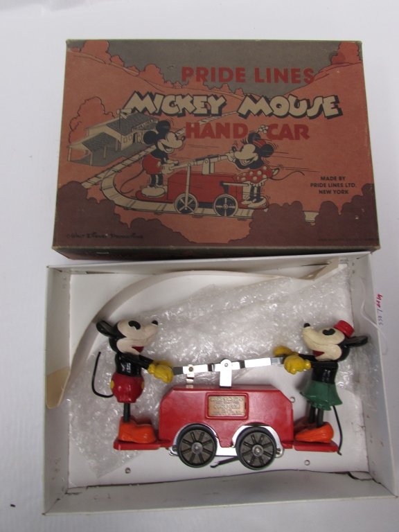 MICKEY MOUSE DISNEY 1100 HAND CAR PRIDE LINE: 338.7 MICKEY MOUSE #1100 WALT DISNEY ELECTRIC TOY TRAIN HAND CAR C-9 EXCEPT FOR BOTTOM METAL PLATE. ORIGINAL BOX C-9. EXCELLENT CONDITION. 9" LONG, 5" TALL.
