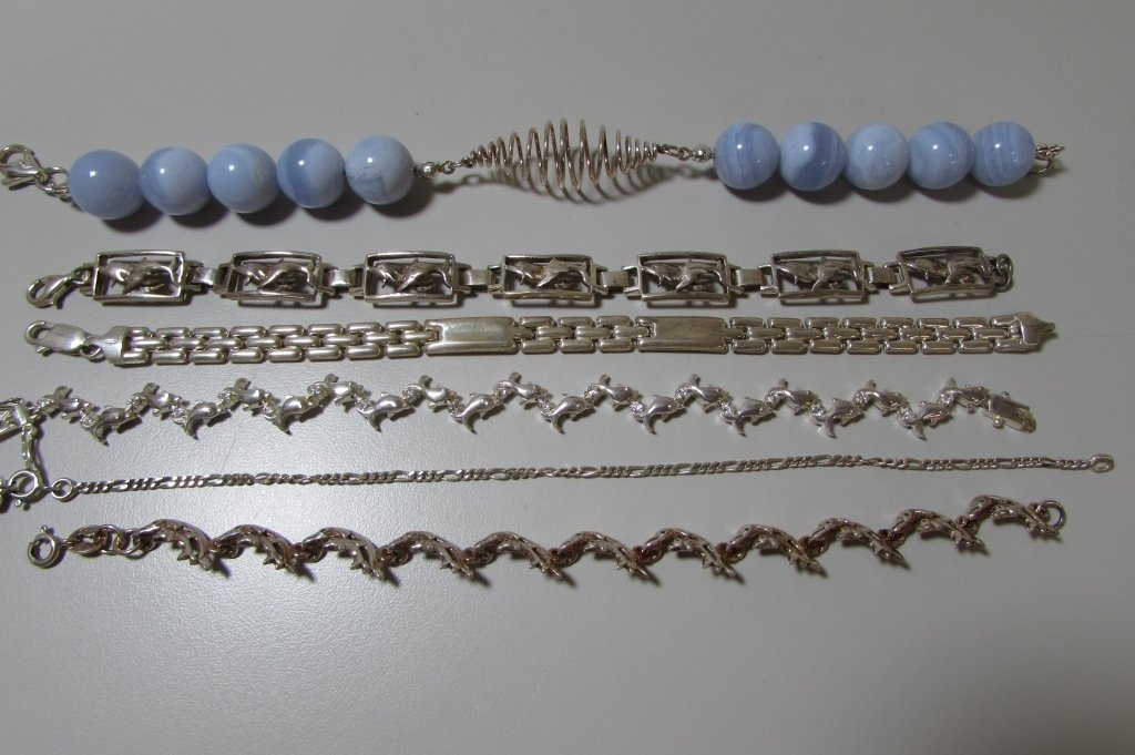 6 BRACELETS STERLING SILVER DOLPHIN SEALIFE 93GRAM: 199.30. ALL NEW OLD STOCK, EXCELLENT CONDITION. 7"- 8" LONG , 13.8MM LAVENDER QUARTZ BEADS. WEIGH 93 GRAMS. GREAT FOR GIFTS!!!