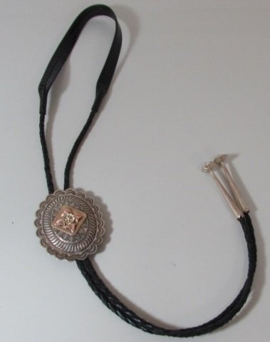 G PETE 14k GOLD STERLING BOLO NAVAJO PENDANT: 38.39 STERLING SILVER & 14 k YELLOW/ROSE GOLD BOLO TIE. SIGNED BY ARTIST G. PETE. 21.5" LONG.