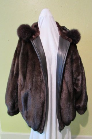SAKS 5TH AVENUE MINK FUR LEATHER SKI JACKET REVERSIBLE: 327.50. GENUINE SAKS FIFTH AVENUE BIRGER CHRISTENSEN MINK FUR & LEATHER COAT. REVERSIBLE. ALL GENUINE PELTS (NOT FAUX). EXCELLENT CONDITION.