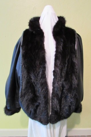 OTTER FUR LINED LEATHER COAT JACKET GENUINE: 327.52 FUR & LEATHER COAT. TYPE OF FUR UNKNOWN, POSSIBLY OTTER, OR PINE MARTEN. NOT FAUX, ALL GENUINE PELTS. SHOWS WEAR. SIZE 8-12.