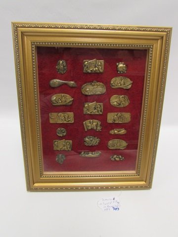 SAMURAI SWORD FITTINGS IN FRAME 20 pc: 188.9 LOT OF 20 SAMURAI SWORD FITTINGS. 3/4" - 2" LONG. GOOD CONDITION.