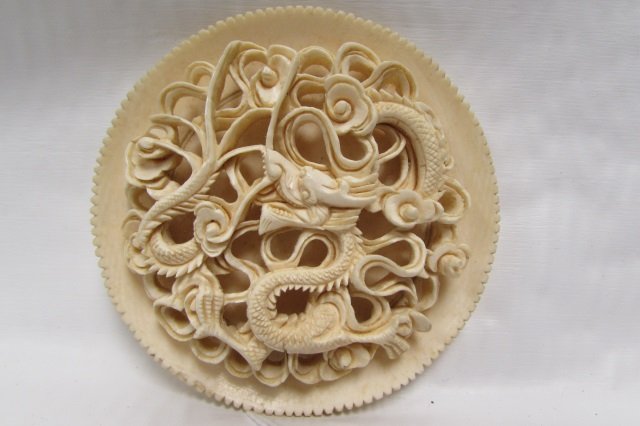 FABULOUS CARVED ANTIQUE IVORY DRAGON MEDALLION A: 3 1/2" PLATE WITH 3 DIMENSIONAL CARVING OF DRAGON WITH LILLY PADS & FLOWERS CIRCA 1920.
