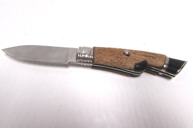 DEER HOOF STYLE SWITCHBLADE KNIFE AUTOMATIC CUSTOM: 26. AUTOMATIC POCKET KNIFE. REAL DEER HAIR LEATHER. 2.75" BLADE, 7" OVERALL.