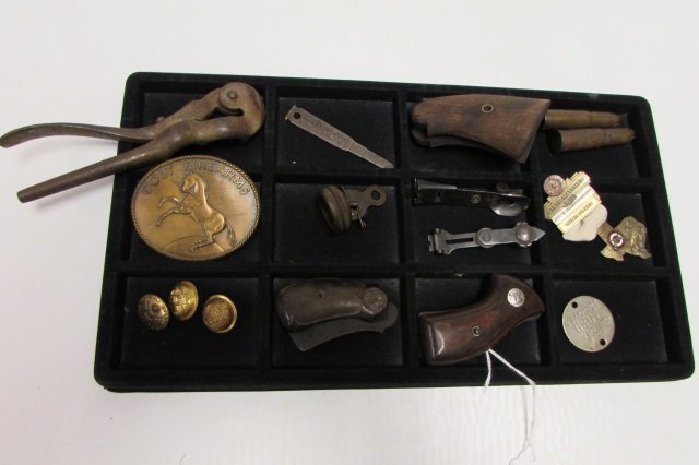 LOT GUN GRIPS BUCKLE BUTTONS BUCKLE S&W COMPASS: 38.44 ASSORTED GUN LOT. COLT BUCKLE, KEY CHAIN, MARBLES COMPASS, WOOD GRIPS, PINS, BUTTONS, CARTRIDGES, ETC. 16 PIECES.