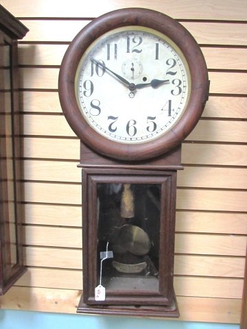NEW HAVEN SINGLE WEIGHT SCHOOL HOUSE OAK CLOCK: 32 1/2 INCH TALL OAK CLOCK 12" DIAL