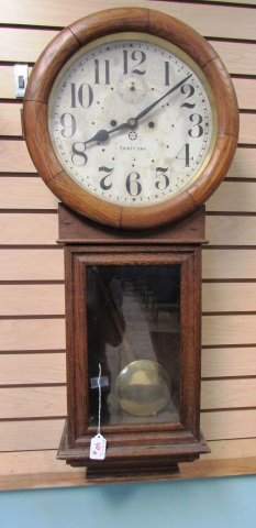 NEW HAVEN 30 DAY REGULATOR CLOCK: 35 " TALL WITH 12 INCH DIAL.WE DO NOT CHECK CLOCKS ALL SOLD AS IS.