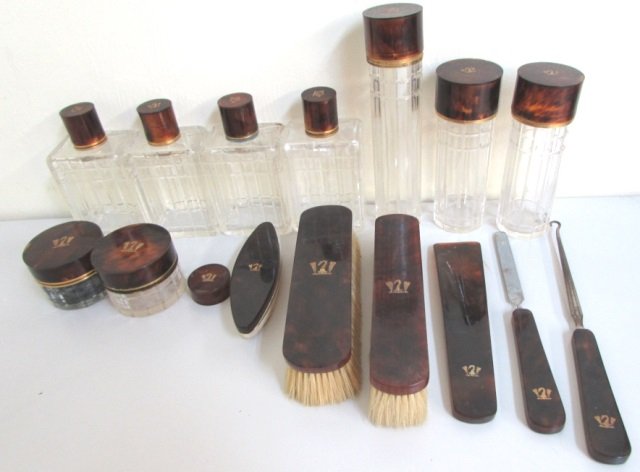 15PC MORABITO TORTOISE SHELL GENTS GROOMING VANITY: CIRCA 1920 GENUINE TORTOISESHELL SET: 4 SCENT TOILETRY BOTTLES 5" X 2 1/2" X 1 3/4", WRITING INK CONTAINER 2 1/4" X 2", 2 BRUSHES 6 1/2" , BUTTON HOOK 8 3/4", NAIL FILE 7 1/2", NAIL BUFF 4 3/4", SHOE