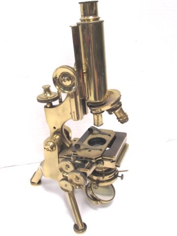EARLY W WATSON & SONS LONDON BRASS MICROSCOPE: ANTIQUE, ADJUSTABLE MONOCULAR MICROSCOPE, MARKED "W. WATSON & SONS LTD 313 HIGH HOLBORN LONDON 23669". 14.5" TALL. MOST KNOBS APPEAR TO WORK. NICE CONDITION FOR ITS AGE, VIEW PHOTOS FOR WEAR.