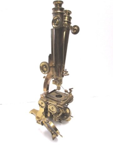 1800s BRASS BINOCULAR MICROSCOPE UNSIGNED: ANTIQUE 19TH CENTURY ADJUSTABLE BINOCULAR MICROSCOPE. UNSIGNED 20" TALL. NICE CONDITION FOR ITS AGE, SOME KNOBS WORK, VIEW PHOTOS FOR WEAR.