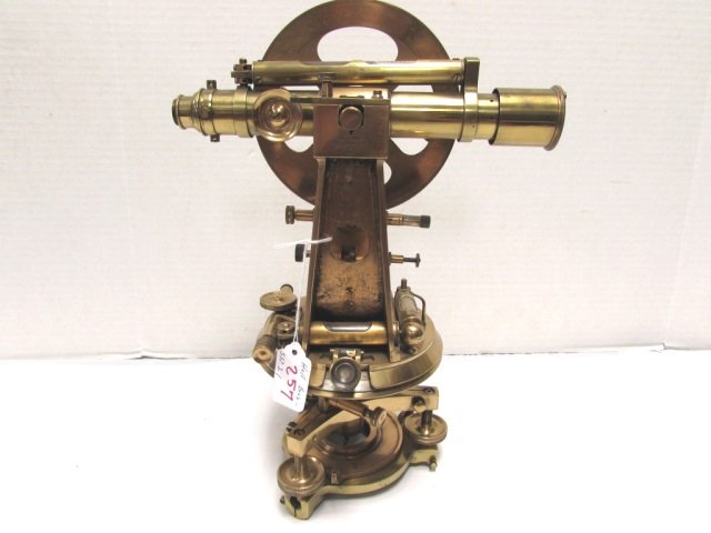 1916 HALL BROS BRASS THEODOLITE SURVEY TRANSIT: MARKED "HALL BROS CLERKENWELL, LONDON 523" MEASURES 14" TALL WITH A 9.75" TELESCOPE. GLASS AND LEVELS ARE ALL INTACT, GREAT CONDITION FOR ITS AGE, SHOWS WEAR, UNKNOWN FUNCTIONALITY.