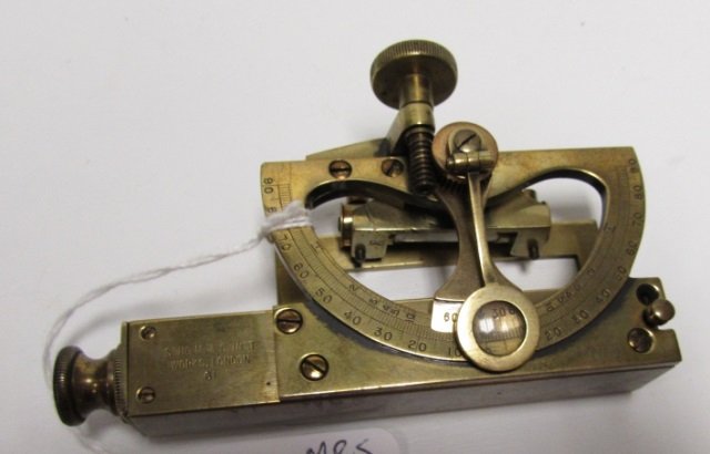 MINIATURE SURVEYING TRANSIT BRASS SOHO LONDON: MARKED "SOHO M & S INST WORKS LONDON 61" MEASURES 4" X 2.5" AND 7" WHEN TELESCOPE IS FULLY EXTENDED. GREAT CONDITION FOR ITS AGE, SHOWS WEAR, UNKNOWN FUNCTIONALITY.