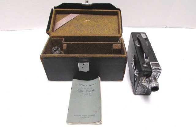 CINE KODAK MODEL K CAMERA RECORDER IN CASE 1920-30: ANTIQUE CINE-KODAK VIDEO RECORDER IN ORIGINAL CASE, w/ INS. MANUAL. CAMERA 9" LONG. GREAT CONDITION.