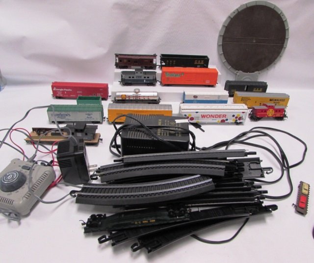 TOY TRAIN LOT CARS ACC TRACK 30 PIECES: TOY TRAIN LOT. CARS, TRACK, BACHMANN CONTROL, ETC. 30+ PIECES.