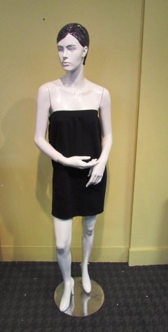 FEMALE MANNEQUIN FULL BODY w/ METAL STAND: 6 ft. TALL. INCLUDES DRESS, SIZE M. HOLE IN LEFT LEG, SOME SCUFFS. (PLEASE SEE PICTURES). DISASSEMBLABLE. NICE, BUT SHE DOESN'T TALK MUCH.