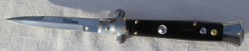 MILANO ITALIAN SWITCHBLADE KNIFE AUTO STILETTO: MILANO PUSH-BUTTON AUTOMATIC POCKET KNIFE w/ LOCK. 4" BLADE, 8.75" OVERALL. NEW, UNUSED CONDITION. SHARP. (SHIPPING FOR THIS ITEM IS $3).
