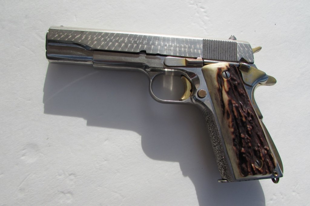REMINGTON RAND 1911 45 CAL PISTOL STAG GOLD: REMINGTON RAND HAND GUN. .45 CAL. SILVER & GOLD COLOUR w/ STAG GRIPS. 5" BARREL. (NO851269) (GUNS REQUIRE FFL, $50 SHIPPING & TRANSFER. SORRY, NO FIREARM SALES TO CA).