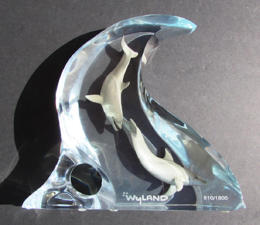 WYLAND DOLPHIN STATUE ART LUCITE WAVE FIGURE COA: ROBERT WYLAND LUCITE WAVE DOLPHIN STATUE. 610/1800 9" TALL, 9" LONG, 3" WIDE. NO DAMAGE. INCLUDES PAPERS. (USA SHIPPING FOR THIS ITEM IS $20).