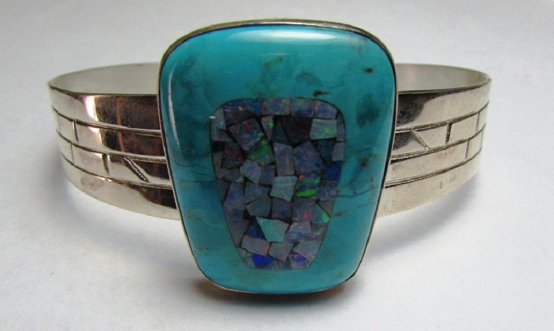 DRT OPAL TURQUOISE STERLING SILVER BRACELET KING: JAY KING DESERT ROSE TRADING OPAL, TURQUOISE, & STERLING SILVER BANGLE BRACELET. 2.5" WIDE. ADJUSTABLE. (USA SHIPPING FOR THIS ITEM IS $5).