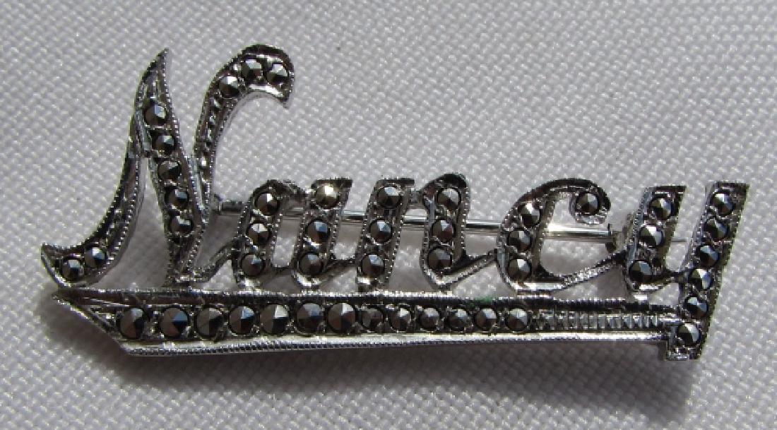 STERLING SILVER MARCASITE PIN BROOCH NANCY KD: STERLING SILVER & MARCASITE "NANCY" BROOCH. ARTIST SIGNED "KD". 1.5" LONG, (USA SHIPPING FOR THIS ITEM IS $3).