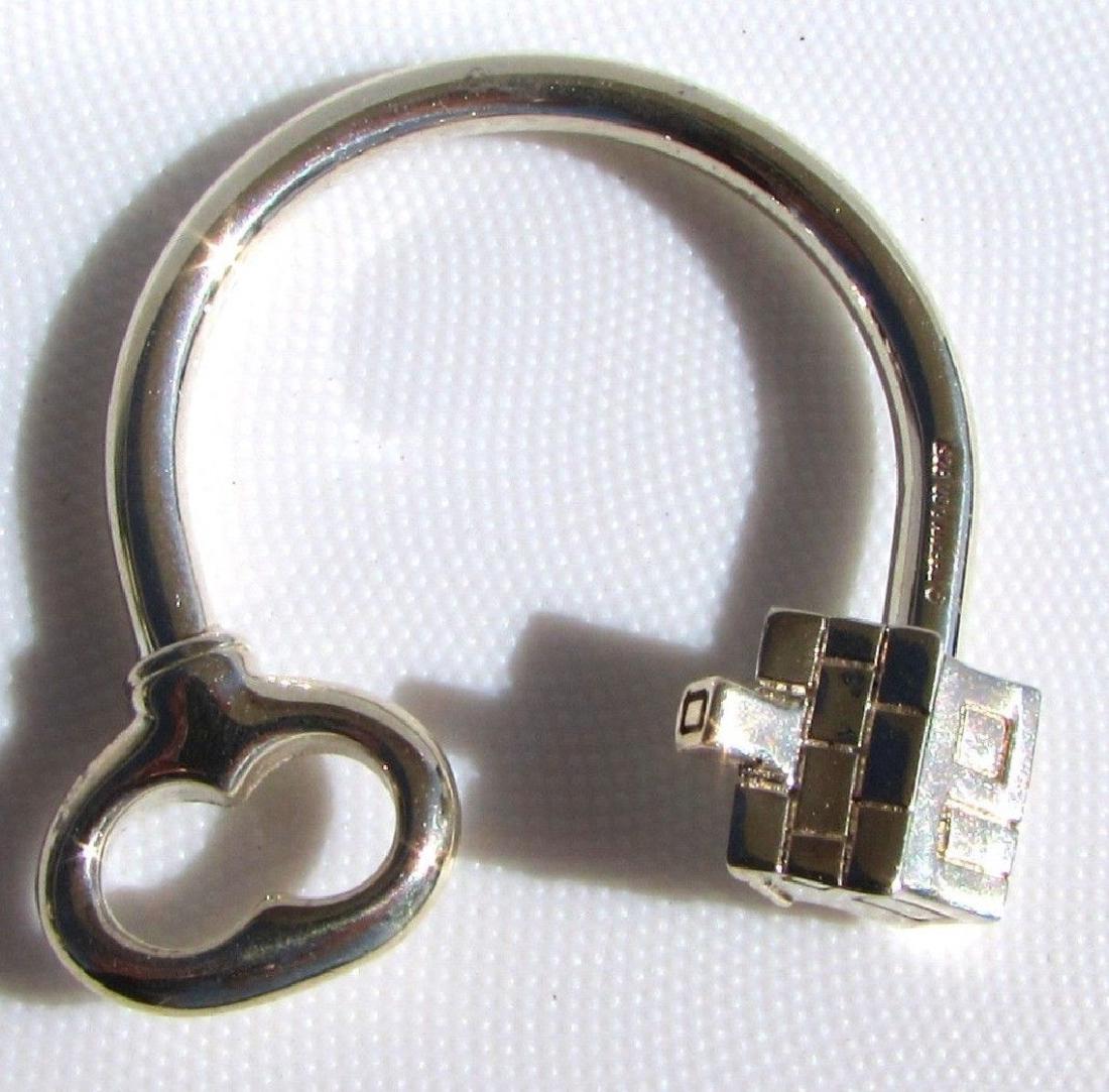 TIFFANY CO STERLING SILVER KEYRING KEY CHAIN 11.7: GENUINE TIFFANY & CO. STERLING SILVER KEYCHAIN. HOUSE / KEY MOTIF. 1 1/2" TALL, 1 3/8" WIDE.(US SHIPPING FOR THIS ITEM IS $5).
