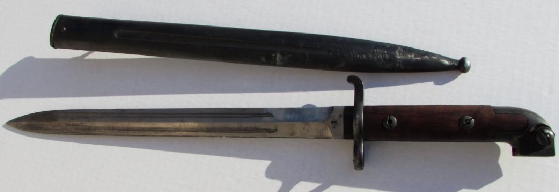 1894 BAYONET EJ AB CARBINE SCABBARD DAGGER KNIFE: 1894 CARBINE BAYONET & SCABBARD. MARKED "EJ AB" w/ ANCHOR & CROWN. 13" BLADE, 18" OVERALL. (US SHIPPING FOR THIS ITEM IS $15).