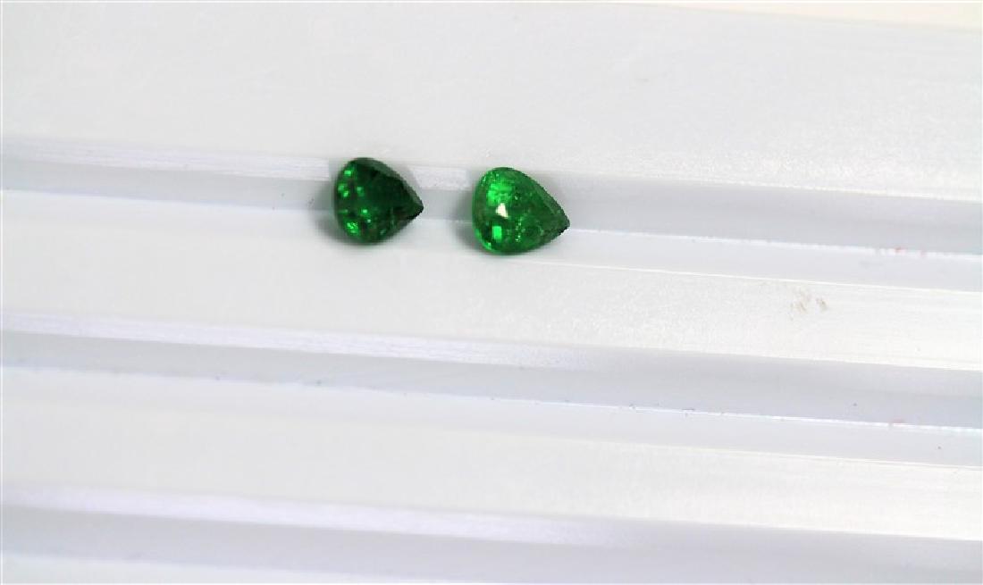 1.67ct Pair Shape Tsavorite ( Match pair) Dimension-: 1.67ct Pair Shape Tsavorite ( Match pair) Dimension- 6.6x5.4x3.2 #TS-117