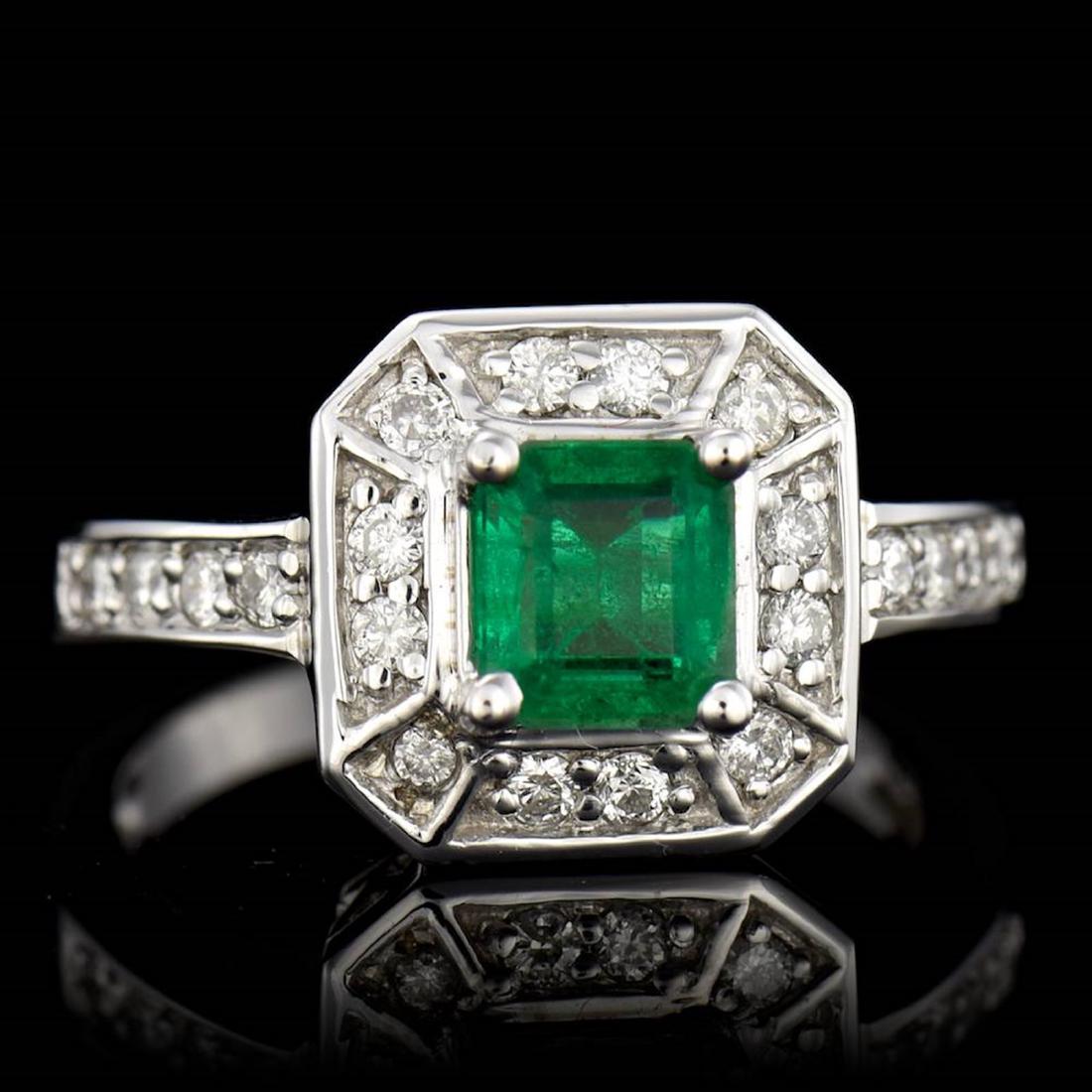 0.89CT NATURAL COLUMBIAN EMERALD 14K WHITE GOLD RING: 14K WHITE GOLD NATURAL COLUMBIAN EMERALD RING :5.40GRAM /EMERALD: 0.89CT/DIAMOND RD :0.36CT/#GVR1284 **The deep green of the 0.89 carat Emerald cut Emerald, a stone known to open the heart and stay ce
