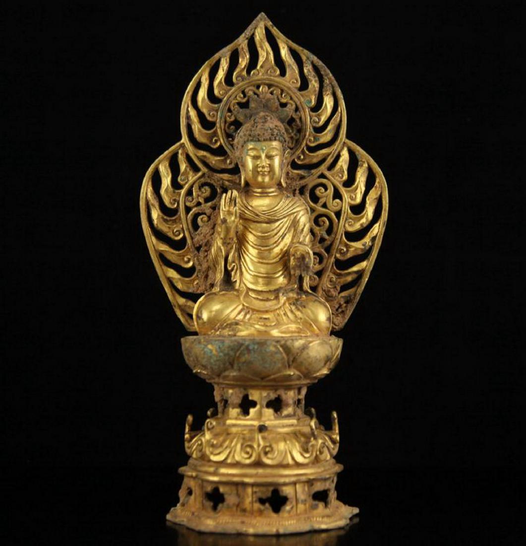 A TANG DYNASTY TIBETAN GILT BRONZE FIGURE OF SAKYAMUNI (1 of 13)