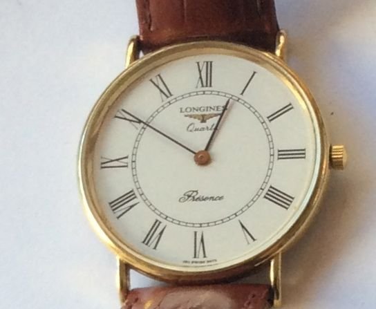 Longines Presence 9k Gold Mens Watch: Quartz Movement, 33mm, Brown leather strap, 9k stamped gold case SKU100377P