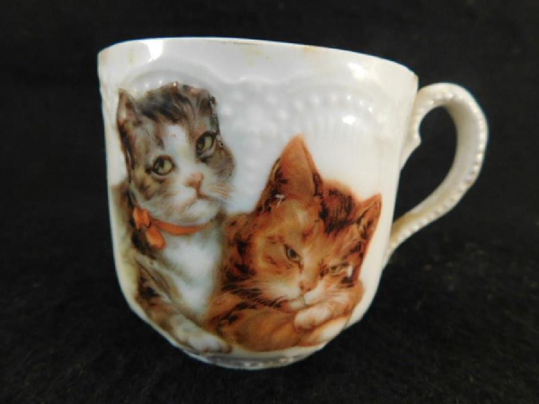 CAT KITTENS PORCELAIN CUP: Thank you for attending HATMAN AUCTIONS! This auction features early and rare Victorian Glass, Vintage Sewing Notions, Fenton, Hummel, Rock as well as modern collectible glass in the later lots of thi