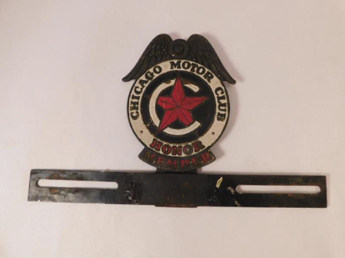 PORCELAIN CHICAGO MOTOR CLUB LICENSE PLATE TOPPER: Thank you for attending HATMAN AUCTIONS! This auctions consists of and ecclectic variety of fantastic quality 1804's Victorian Era Glass, antiques, Advertising, Art, Fenton, Hummel, Disney, Rare Rocks