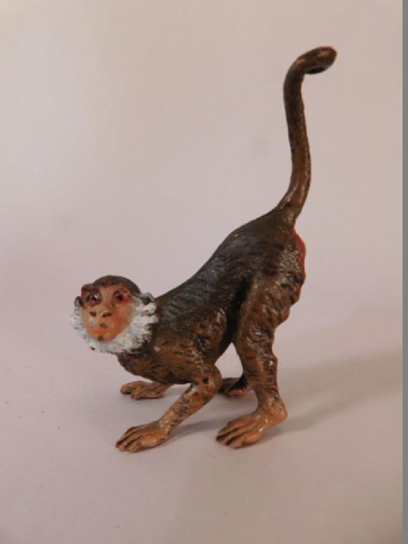 VINTAGE METAL MONKEY MINIATURE HEAVY: Thank you for attending HATMAN AUCTIONS! This auctions consists of and ecclectic variety of fantastic quality 1812's Victorian Era Glass, antiques, Advertising, Art, Fenton, Hummel, Disney, Rare Rocks