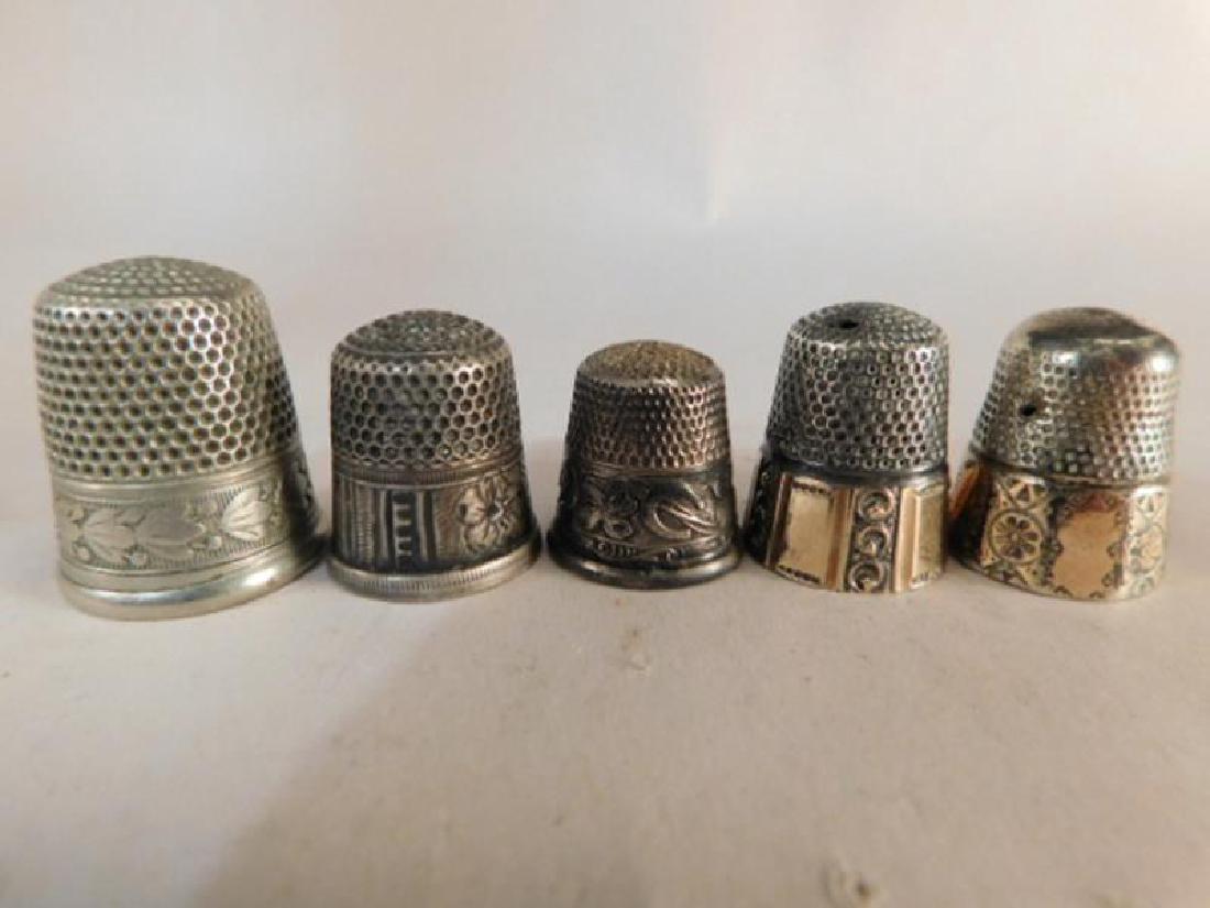 THIMBLES SEWING COLLECTIBLE VICTORIAN ERA ANTIQUE: Thank you for attending HATMAN AUCTIONS! This auctions consists of and ecclectic variety of fantastic quality 1989's Victorian Era Glass, antiques, Advertising, Art, Fenton, Hummel, Disney, Rare Rocks