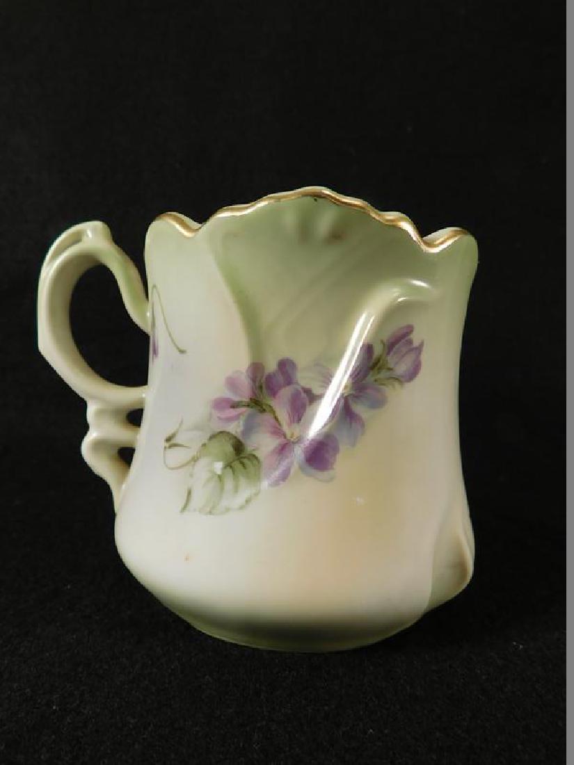 BRANDENBURG CUP MUSTACHE FLORAL PORCELAIN (YES, WE: Thank you for attending HATMAN AUCTIONS! This auctions consists of several lots of antiques, advertising, ephemera, rare rocks, Fenton, Hummel, Disney and other collectibles. Please see photos for mea