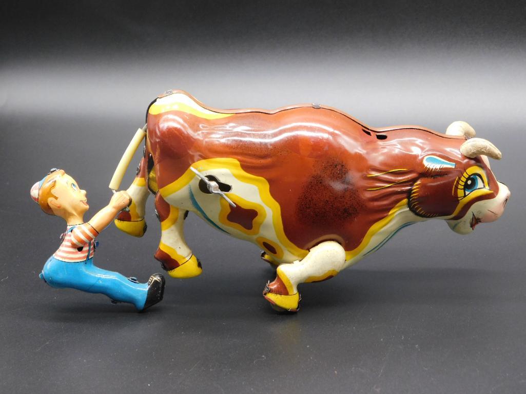 BULL PULLING BOY TIN TOY  ANTIQUE& VINTAGE (1 of 2)
