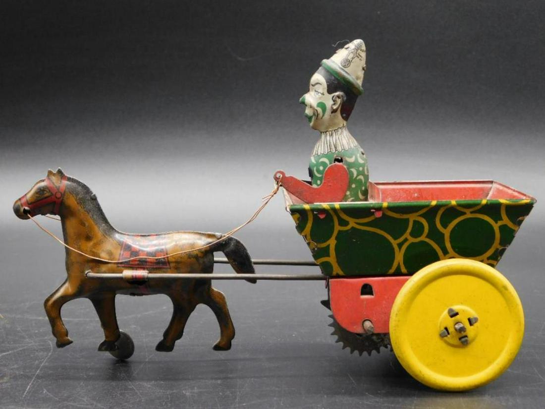 CLOWN DRIVING CARRIAGE TIN TOY VINTAGE ANTIQUE: Thank you for attending HATMAN AUCTIONS! Yes, we ship all items that are not oversized. Please see photos for measurements and description This is the THIRD AUCTION in our SUMMER AUCTION SERIES. Futur