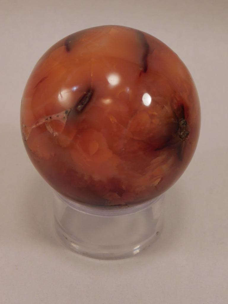 CARNELIAN SPHERE ROCK STONE LAPIDARY SPECIMEN: Thank you for attending HATMAN AUCTIONS! Please see photos for measurements and descriptions. If you purchase lots of heavy items, we can hold them for you until you can pick them up. *We are an aucti